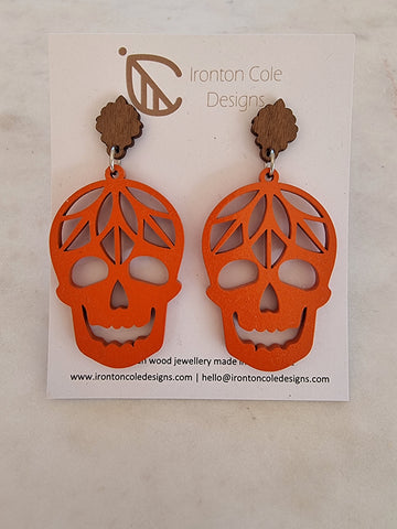 Orange skull earrings