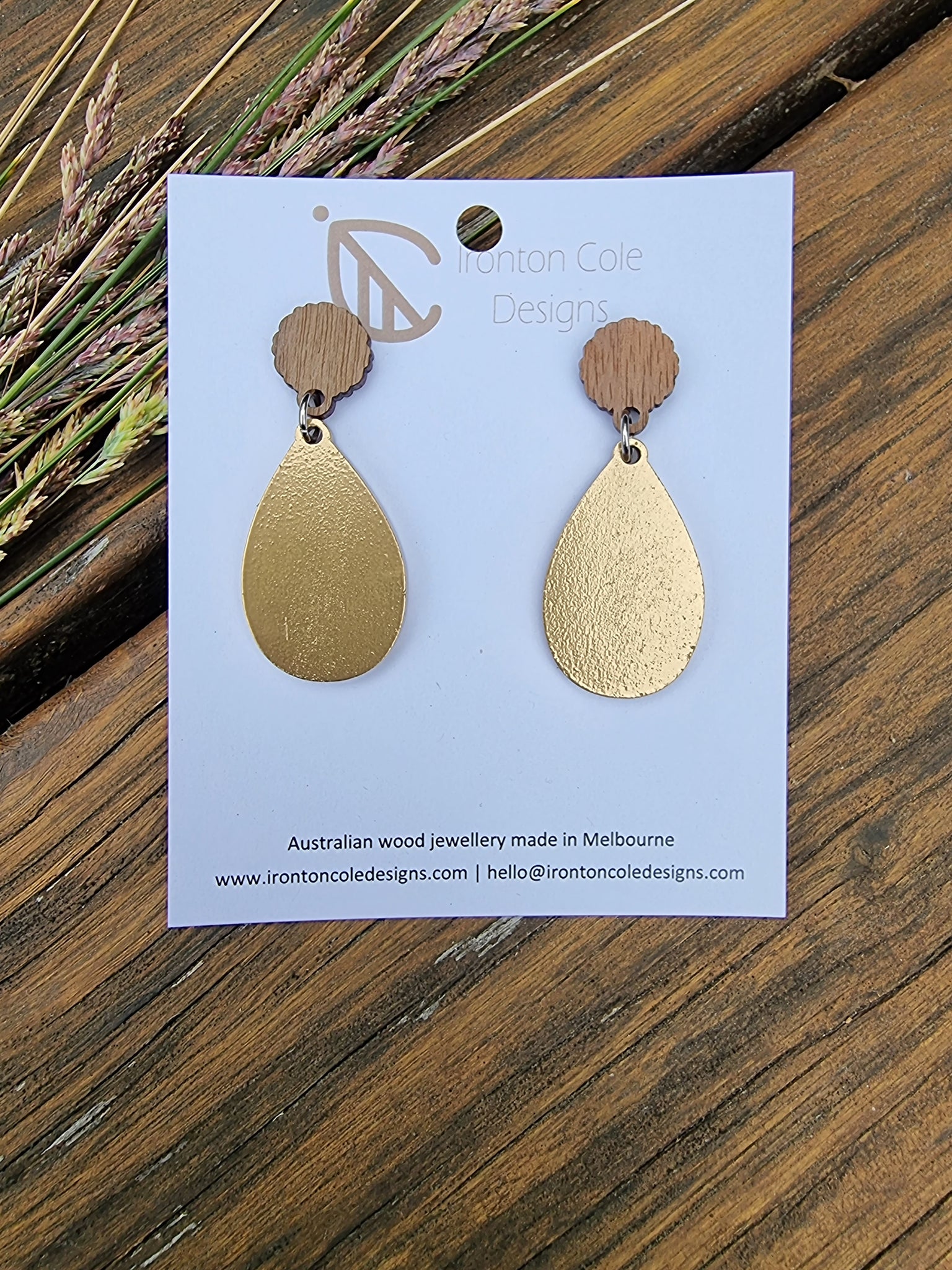 Gold painted tear drop shaped wooden earrings. Hypoallergenic posts. 