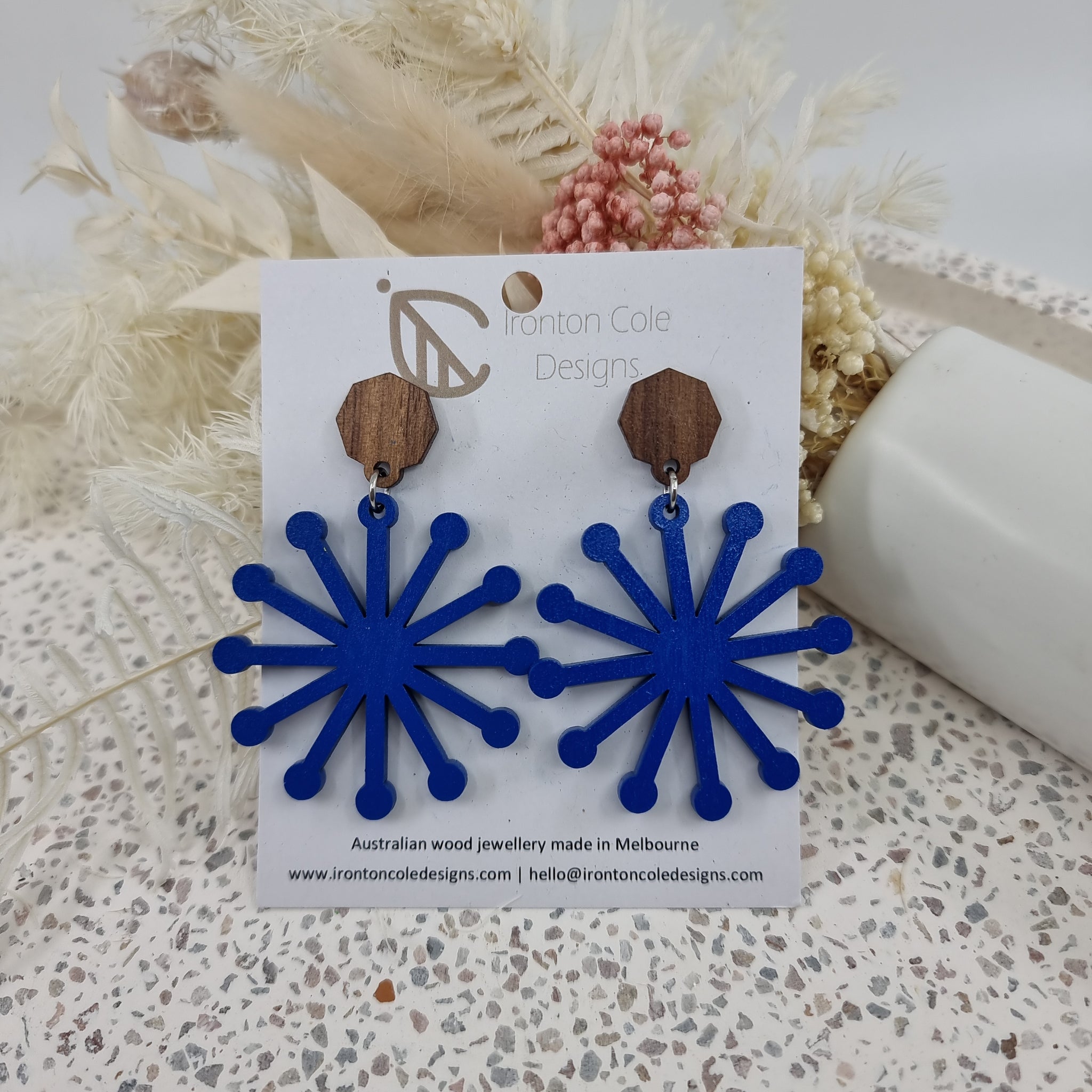 Blue wood star earrings