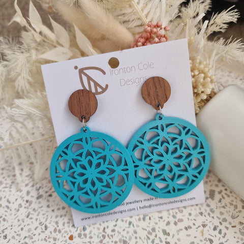 Round baby blue wooden earrings