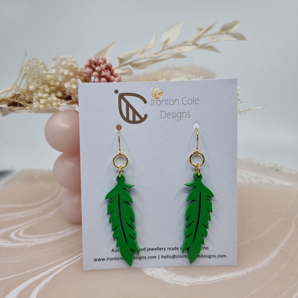 Green wooden feather earrings