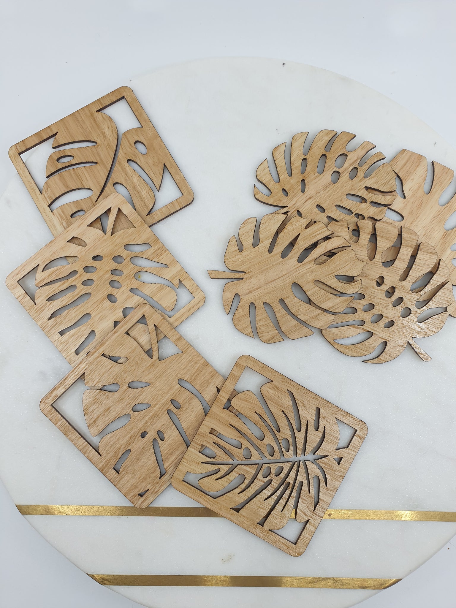 Monstera wooden leaf coasters  -  eight pieces
