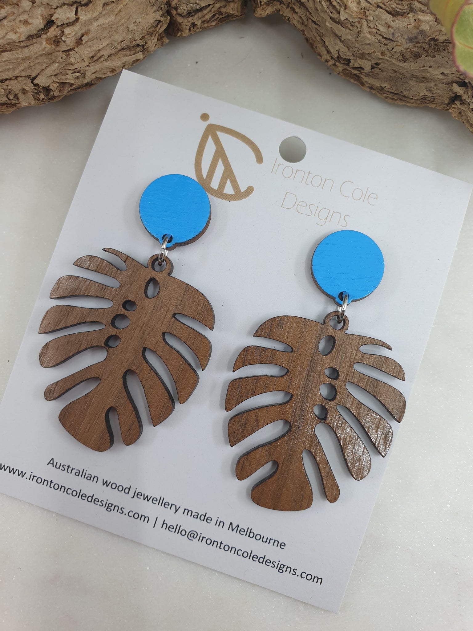 Wooden monstera earrings baby blue