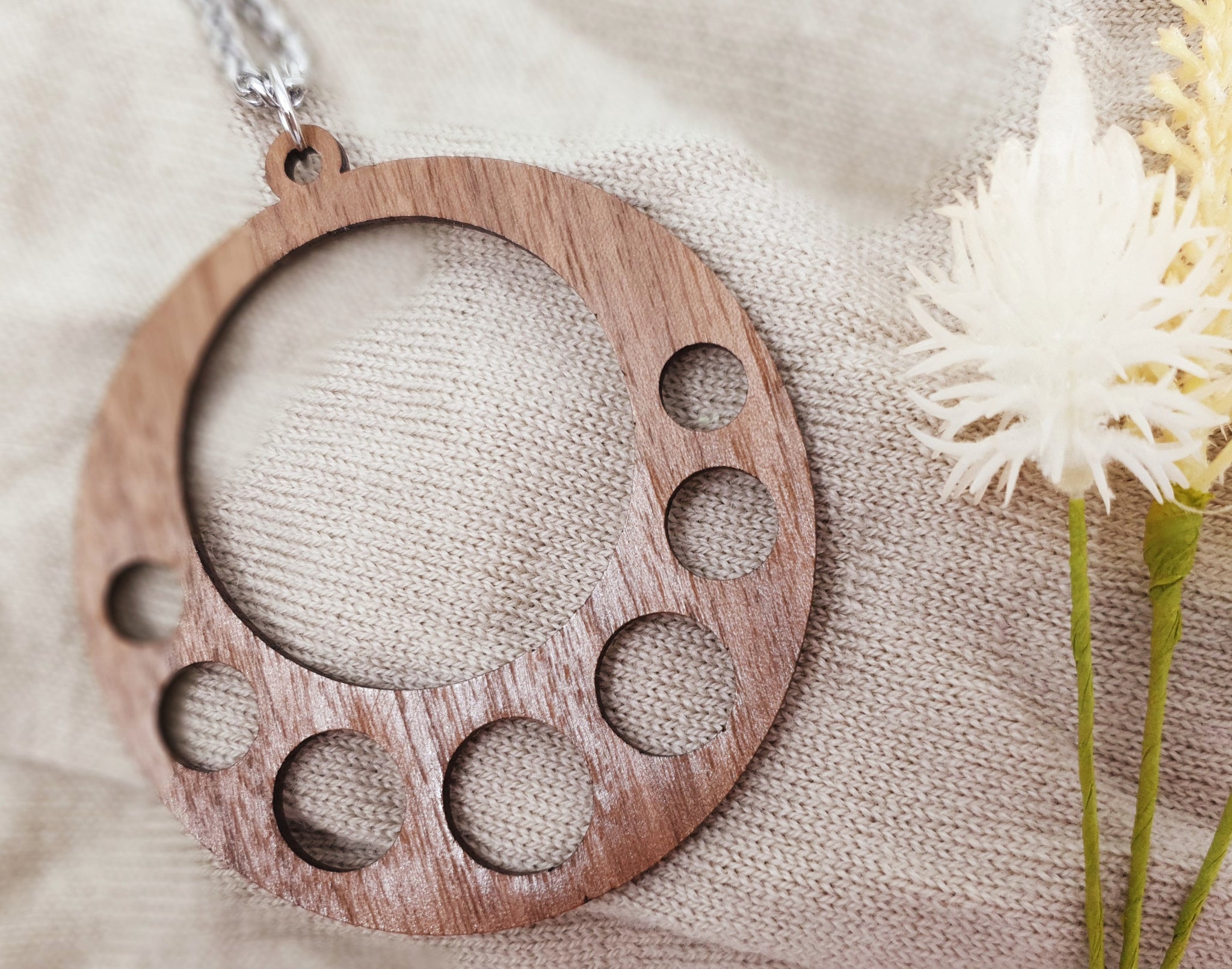 Circular wooden pendant