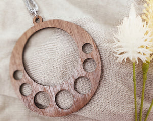 Circular wooden pendant