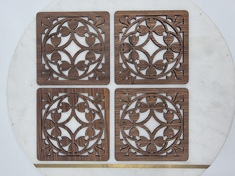Square wooden coasters with a tulip celtic design. Made from Queensland walnut. 