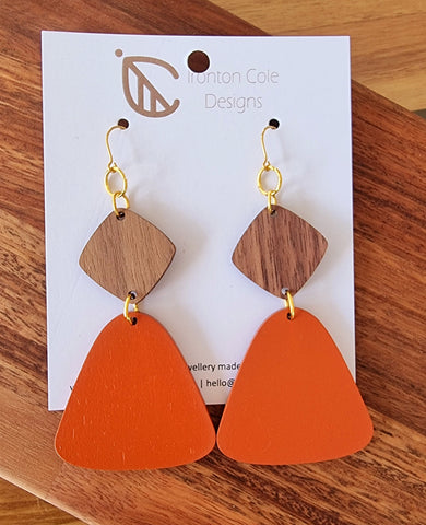 Burnt orange and Queensland walnut dangle earrings. Hypoallergenic gold hooks.