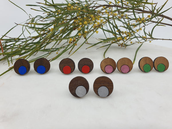 Round wooden studs with a dot of colour. Hypoallergenic posts. 2.5cm in width. Made from eucalyptus or queensland walnut.