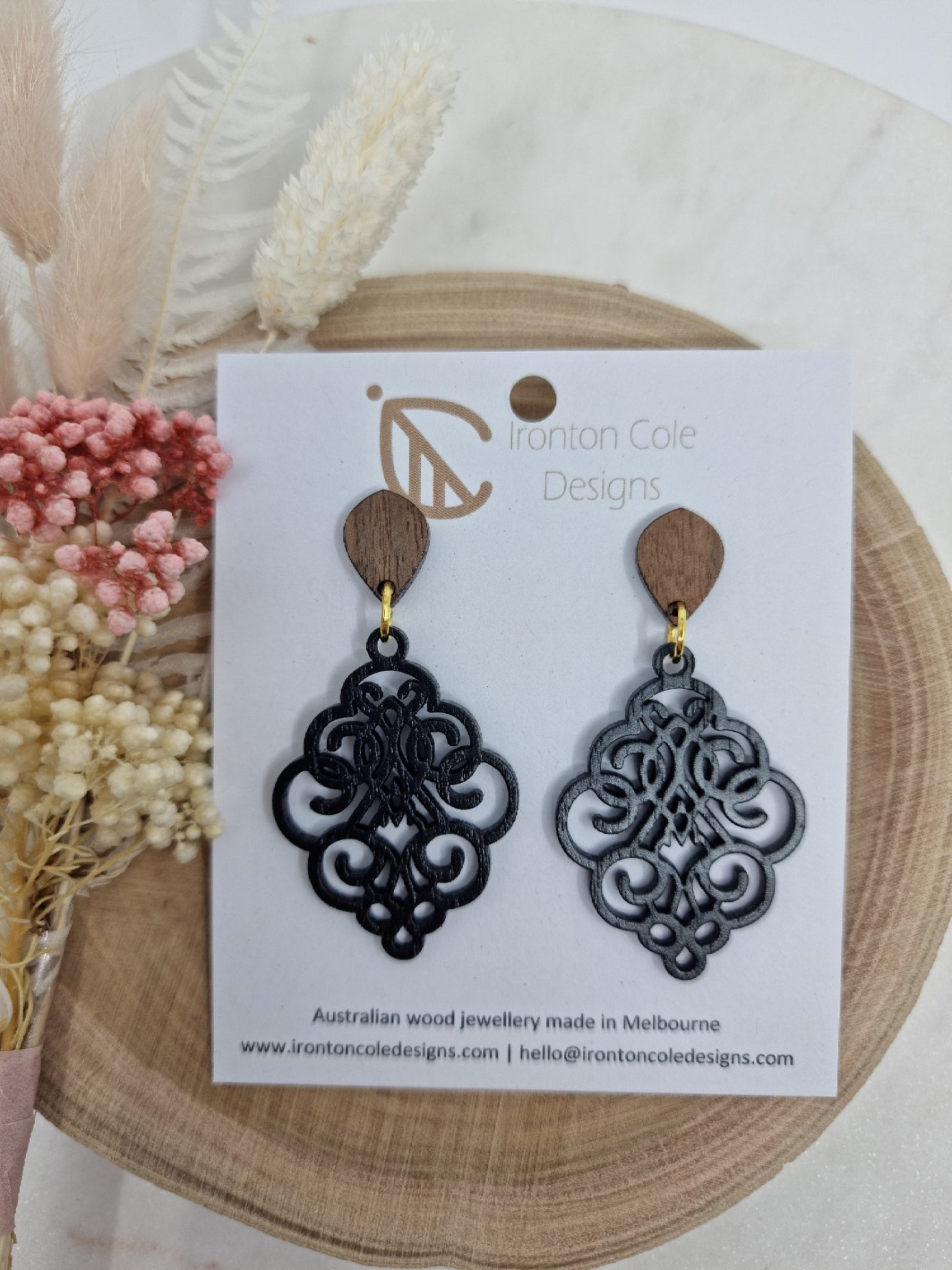 Black loopy wooden earrings
