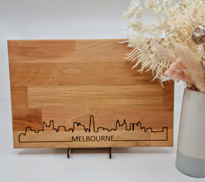 Wooden cheese board with Melbourne skyline